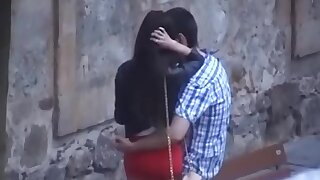 Spanish couple kissing on the urgency